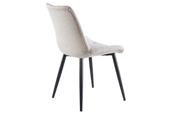 Conjunto de comedor compuesto por una mesa extensible de diseño industrial, con tablero de madera y patas metálicas negras, acompañado de 4 sillas tapizadas en distintos colores a elegir, ideales para ambientes modernos y funcionales.