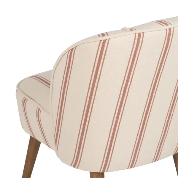 Butaca Artisa disponible en dos elegantes versiones: terracota con rayas y verde con rayas. Su diseño atemporal, combinado con patas de madera de caucho, la convierte en una pieza versátil y acogedora para cualquier espacio. Ideal para añadir calidez y personalidad a tu hogar.