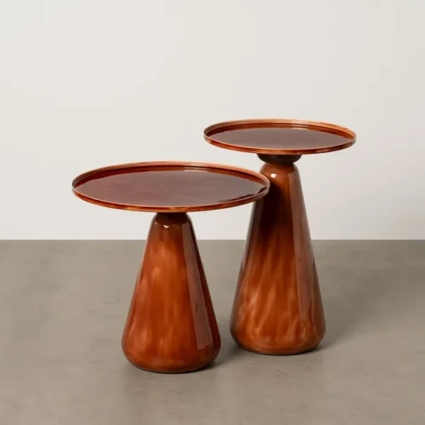 Set de mesa de centro de Artisa con diseño elegante, estructura de metal y acabado en piedra natural.