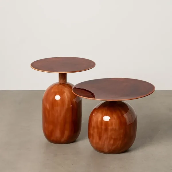 Set de mesa de centro de Artisa con diseño elegante, estructura de metal y acabado en piedra natural.