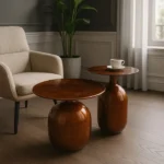 Set de mesa de centro de Artisa con diseño elegante, estructura de metal y acabado en piedra natural.