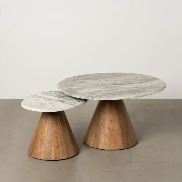 Set de mesa de centro de Artisa con diseño elegante, estructura de metal y acabado en piedra natural.