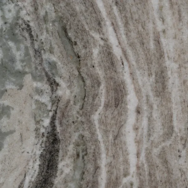 Set de mesa de centro de Artisa con diseño elegante, estructura de metal y acabado en piedra natural.