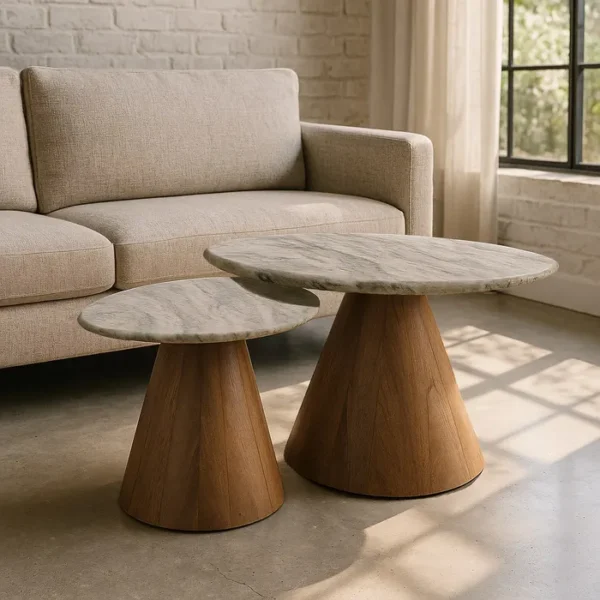 Set de mesa de centro de Artisa con diseño elegante, estructura de metal y acabado en piedra natural.