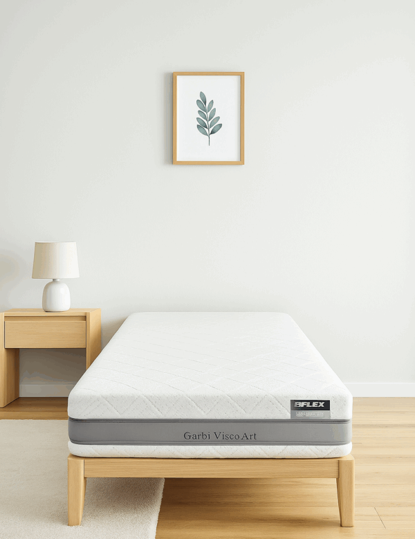 Colchón Flex Garbi Visco Art sobre cama de madera en habitación minimalista blanca