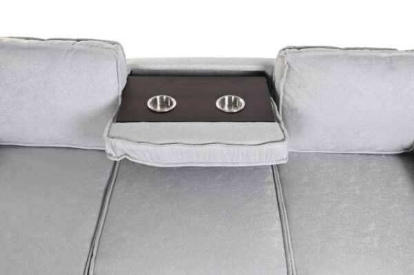 Sofá de 3 plazas en gris claro con chaiselongue, función cama y respaldo convertible en portavasos, disponible en Artisa.