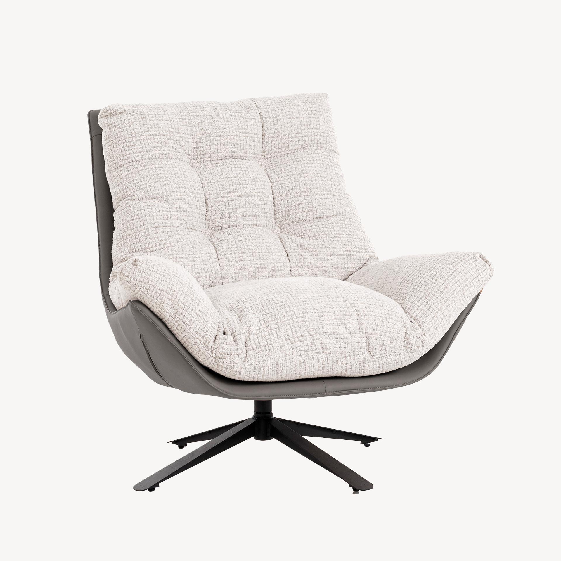 Sillón giratorio moderno de Artisa, tapizado en tejido suave y disponible en varios colores. Diseño ergonómico y elegante ideal para cualquier espacio del hogar.