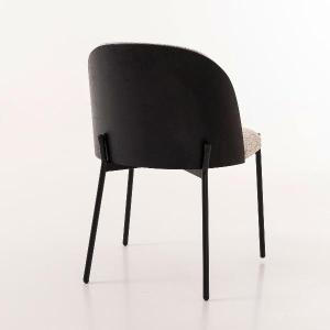 La silla moderna de Artisa destaca por su diseño actual y confort envolvente. Su respaldo curvado tapizado y su estructura metálica crean un equilibrio perfecto entre estilo y funcionalidad.