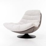 Sillón giratorio moderno de Artisa, tapizado en tejido suave y disponible en varios colores. Diseño ergonómico y elegante ideal para cualquier espacio del hogar.