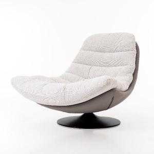 Sillón giratorio moderno de Artisa, tapizado en tejido suave y disponible en varios colores. Diseño ergonómico y elegante ideal para cualquier espacio del hogar.