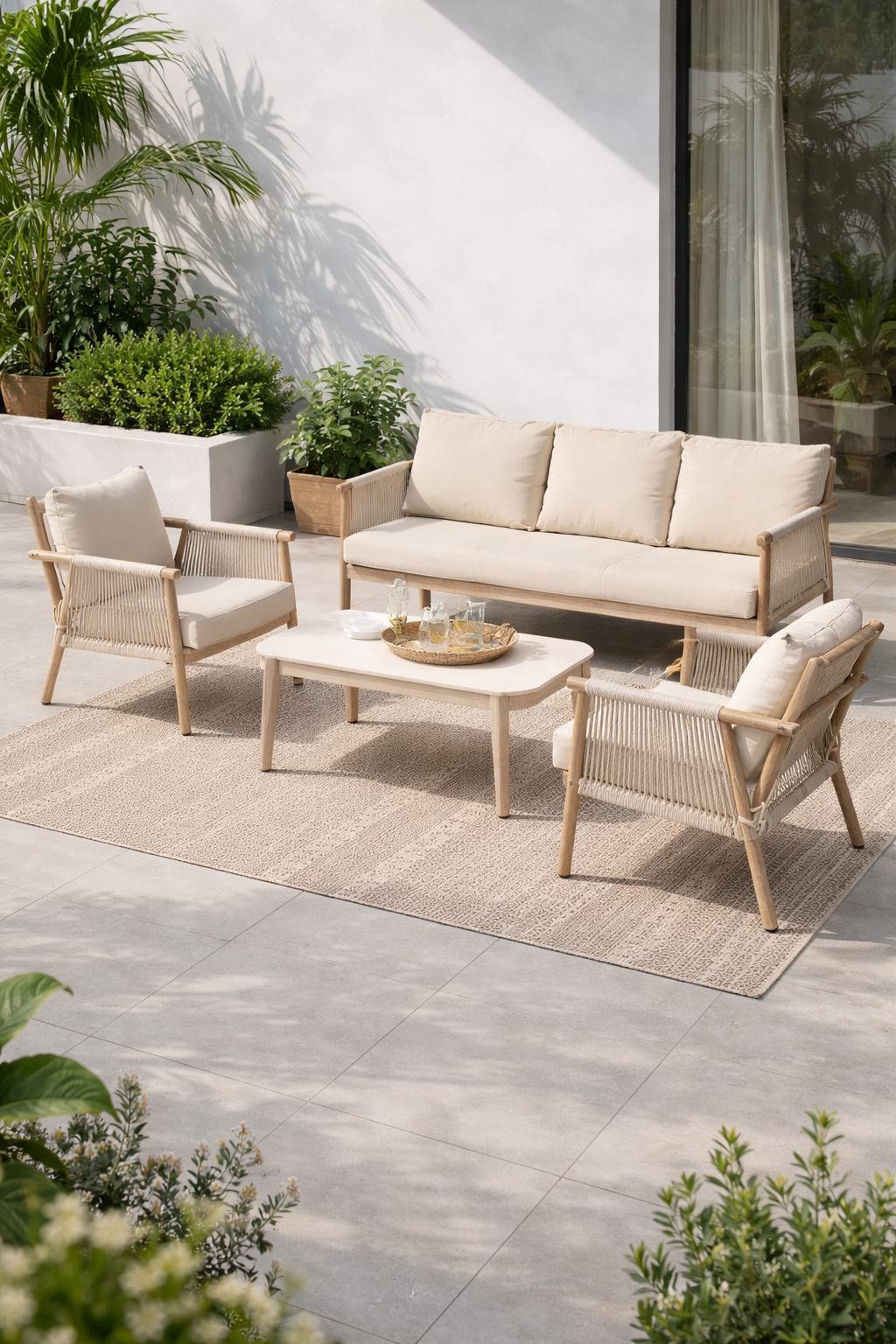 Conjunto de jardín SALINA con sofá, 2 sillones y mesa de centro con cuerda trenzada y estructura de acero disponible en Artisa.