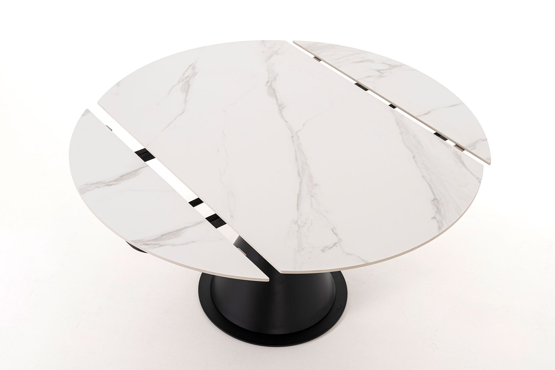 Mesa Comedor Extensible Giratoria en acabado mármol blanco con tapa metálica en color negro